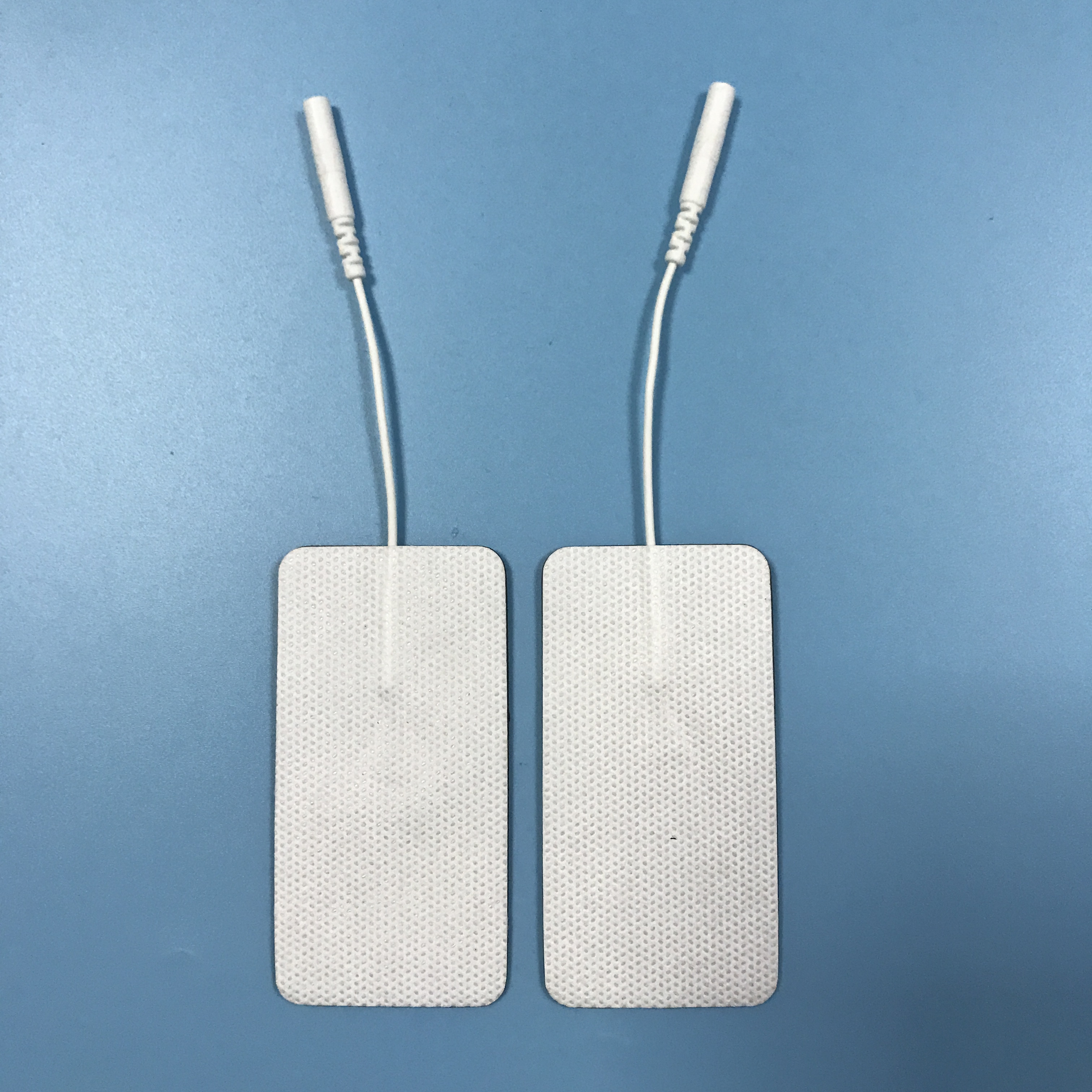 Wholesale 2.0/2.5mm tail fiber TENS, self-adhesive physical therapy, electrode pads for electrotherapy